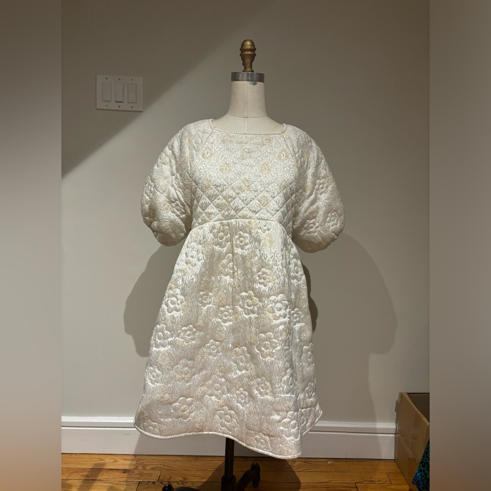 Babydoll dress Kimchi Blue quilted backless puff sleeve mini dress